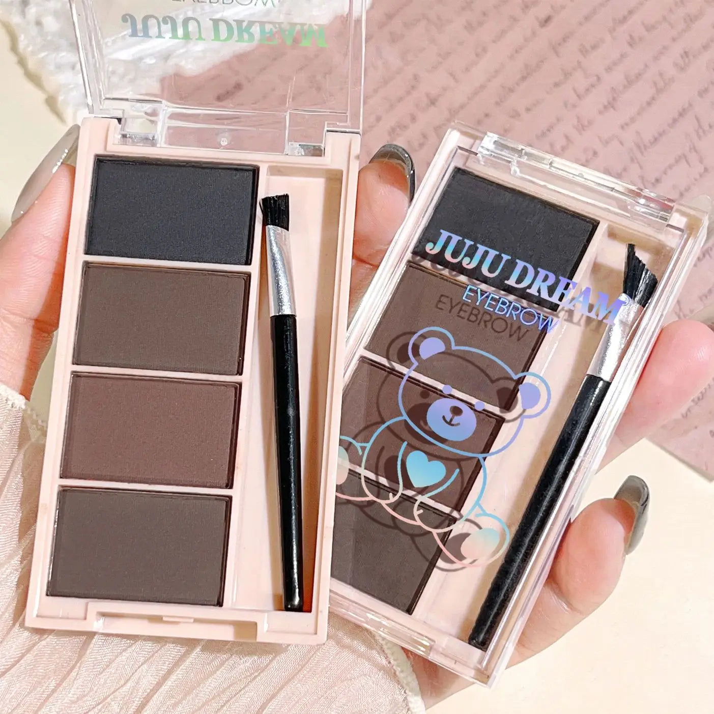 Eyebrow powder trays with brushes in gray and brown matte tones for long-lasting color.